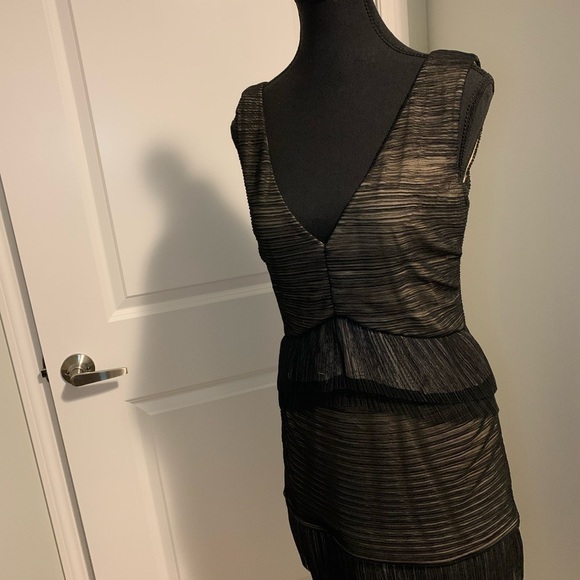 BCBG black dress in size Medium. Place offer I will defently consider Thanks. - Picture 4 of 10